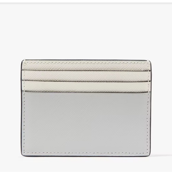 Kate Spade Madison Small Slim Card Holder
Platinum Grey Multi
NWT - Picture 4 of 16